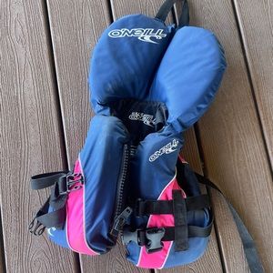 O’Neill brand infant life jacket. Blue and pink.